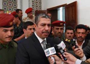 BACK IN ACTION  A file picture taken on December 18, 2014 shows Yemeni Prime Minister Khaled Bahah speaking to the press after a voting session of parliament. Bahah and several of his ministers traveled to Aden on September 16 from exile in Saudi Arabia, two months after loyalist forces pushed Iran-backed rebels out of the city. AFP PHOTO