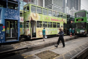 DON’T MESS WITH THE DINGDINGS In this photograph taken on August 25, a worker walks by tramways parked at a tram depot in Hong Kong. A new proposal to take Hong Kong’s beloved trams off the streets has sparked a wave of anger from residents who fear losing track of the city’s past. Known as “ding-dings” for the sound of their bells, trams have served the northern coastline of the city’s main island for more than 110 years and still carry around 200,000 passengers a day. AFP PHOTO