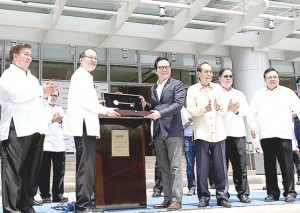 GONE SOUTH President Benigno Aquino 3rd receives the symbolic key to the 12-story Richmonde Hotel, located in front of the Iloilo Convention Center.