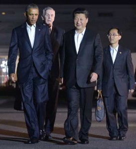 MAJOR MEETING US President Barack Obama and China’s President Xi Jinping (second from right) walk from the White House to a working dinner at Blair House, on Friday in Washington, D.C. AFP PHOTO