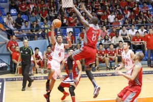 FEARLESS  San Beda’s Ryusei Koga (4) attempts a lay-up against Lyceum’s center Jean Victor Nguidjol during NCAA Season 91 men’s basketball action on Thursday at The Arena in Pasay City. PHOTO BY OSWALD LAVINA