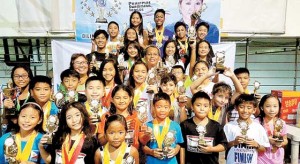 Philippine Swimming League President Susan Papa and Technical Director Ed Mascardo with the Most Outstanding Swimmer awardees in the 83rd Philippine Swimming League (PSL) National Series held at the Diliman College Swimming Pool in Quezon City.  CONTRIBUTED PHOTO