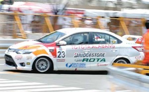 Estefano Rivera negotiates a curve during the Toyota Vios Cup Season 2 held at the Manila Bay Circuit in the Mall of Asia Complex in Pasay City on Sunday. PHOTO BY RENE H. DILAN