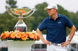 Jordan Spieth of the United States poses on the 18th green after winning both the TOUR Championship By Coca-Cola and the FedExCup at East Lake Golf Club on Monday in Atlanta, Georgia. AFP PHOTO