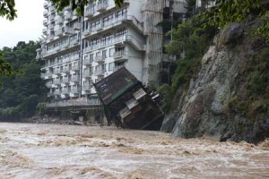 UNUSUALLY WET WEATHER  A hotel building falls into the floodwaters at Nikko mountain resort in Tochigi prefecture, north of Tokyo on September 10. Authorities in central Japan ordered tens of thousands to flee their homes after torrential rains flooded rivers and triggered landslides, with one person missing after a mudslide buried houses. The Japan Meteorological Agency issued special downpour warnings for Tochigi and Ibaraki prefectures, north of Tokyo, urging vigilance against mudslides and flooding. AFP PHOTO