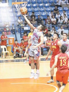 SMOOTH OPERATOR AU’s Giovani Jalalon blasts through the Stags’ defense to score an easy basket in the National Collegiate Athletic Association Season 91 men’s basketball tournament at The Arena in San Juan City on Friday.  PHOTO BY OSWALD LAVINA