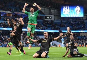 ENDGAME CELEBRATION  Juventus’ goalkeeper from Italy Gianluigi Buffon (C) celebrates with teammates after wining a UEFA Champions League group stage football match between Manchester City and Juventus at the Etihad stadium in Manchester, England on Wednesday. AFP PHOTO.