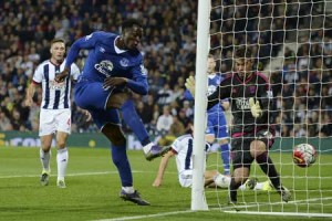 Everton’s Belgian striker Romelu Lukaku (second left) scores their third goal during the English Premier League football match between West Bromwich Albion and Everton at The Hawthorns in West Bromwich, central England, on Tuesday. AFP PHOTO