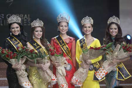 Winners of 2015 Miss Global Philippines are all smiles after their coronation at the Resorts World Manila in Pasay City. From left are 4th runner-up Meryl Angeline King, 2nd runner-up Mary Eileen Gonzales, Miss 2015 Global Philippines Mary Candice Ramos, 1st runner-up Henna Santos and 3rd runner-up Angela Aninang. Ramos will represent the Philippines in the Miss Global 2015 pageant to be held in Manila in October. PHOTO BY RUSSEL PALMA