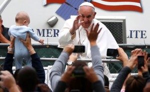 FAREWELL Pope Francis waves to people from the popemobile during a parade on Sunday in Philadelphia. AFP PHOTO 