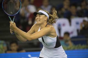 Maria Sharapova of Russia hits a shot to Barbora Strycova of Cezch Republic during their women’s singles match at the Wuhan Open tennis tournament in Wuhan, China’s Hubei province on Tuesday. AFP PHOTO