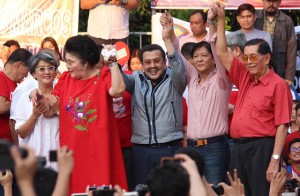 The son also rises Sen. Ferdinand Marcos Jr. is flanked by Manila Mayor Joseph Estrada and Sen. Juan Ponce Enrile. Also in photo are former first lady Imelda Marcos and irene Marcos-Araneta. Photo by Ruy T. Martinez 