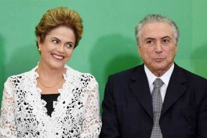 UNDER SCRUTINY  Brazilian President Dilma Rousseff (L) and her Vice-President Michel Temer attend the inauguration ceremony of new ministers at the Planalto Palace in Brasilia on October 5. A Brazilian court has ruled that Rousseff can be investigated for misuse of funds from state oil giant Petrobras during the 2014 election campaign. AFP PHOTO