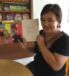 Teacher Dyali Justo of Adarna House encourages parents to read stories to their children in an interactive way