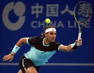 Rafael Nadal of Spain hits a return against Vasek Pospisil of Canada during their second round men’s singles match at the China Open tennis tournament in Beijing on Wednesday.  AFP PHOTO