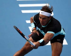 Rafael Nadal of Spain hits a return against Jack Sock of the US during their quarterfinals men’s singles match at the China Open tennis tournament in Beijing on Friday. AFP PHOTO