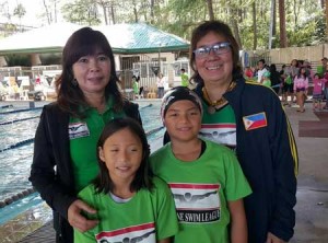 Philippine Swimming League President Susan Papa (right) and Secretary General Maria Susan Benasa with record breakers Micaela Jasmine Mojdeh (right) and Aubrey Tom. CONTRIBUTED PHOTO