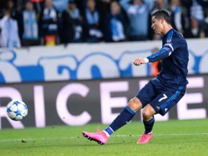 Real Madrid’s Portuguese forward Cristiano Ronaldo shoots to score during the UEFA Champions League first-leg Group A football match between Malmo FF and Real Madrid CF at the Swedbank Stadion, in Malmo, Sweden on Thursday. AFP PHOTO