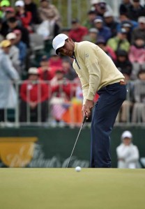 Filipino-Australian Jason Day putts on the 2nd hole during the final round singles matches of the 2015 Presidents Cup at the Jack Nicklaus Golf Club in Incheon, South Korea. AFP PHOTO