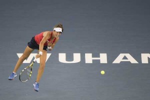 Johanna Konta of Britain returns a shot to Simona Halep of Romania during the women’s singles match on day three of the Wuhan Open tennis tournament in Wuhan, in China’s Hubei province on Thursday. AFP PHOTO
