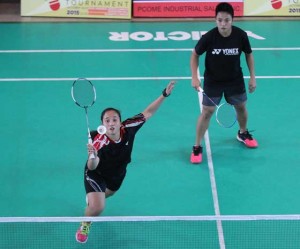 Danica Bolos (left) chases an overhead shot as teammate Jennifer Cayetano looks on during their quarterfinal duel with Descka Calimlim and Fatima Cruz in the Open women’s doubles of the Bingo Bonanza National Open at Glorietta 5. CONTRIBUTED PHOTO