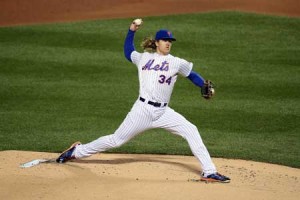 Noah Syndergaard no.34 of the New York Mets pitches in the first inning against the Kansas City Royals during Game Three of the 2015 World Series at Citi Field on Saturday in New York City. AFP PHOTO