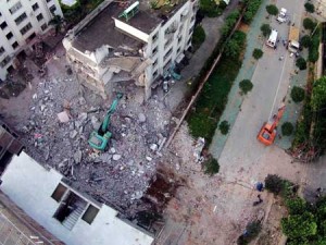 BOMBING SPREE  A damaged building is seen a day after a series of blasts in Liucheng County in Liuzhou, south China’s Guangxi province on October 1. Seven people were killed on September 30 when 17 letter bombs exploded in southern China, state media said, with blasts reported in multiple locations including government offices. AFP PHOTO