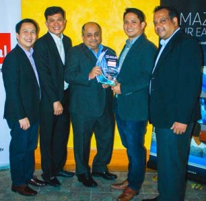 CignalTV executives receive a plaque of appreciation from Dolby Laboratories representatives