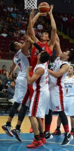 TRIPLE TROUBLE Samigue Eman of Alaska scores a basket against three defenders of Black Water during the 2016 PBA Philippine Cup at the MOA Arena on Friday. PHOTO BY RUSELL PALMA