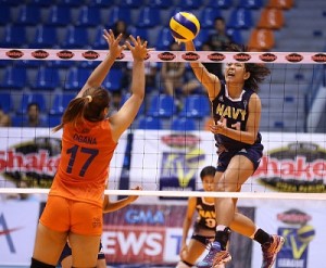 Navy’s Lilet Mabbayad (11) scores on an attack point against Coast Guard’s Melissa Ogana during their Shakey’s V-League Season 12 Reinforced Conference at The Arena in San Juan City on Saturday. CONTRIBUTED PHOTO 