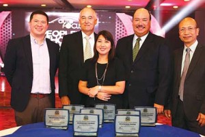 Volkswagen Philippines’ team, headed by its president and CEO John Philip Orbeta (2nd from right), stands with the Media’s Choice accolades. Also shown in photo, from left: marketing director Franz Decloedt, chief operating adviser Klaus Schadewald, PR and Events head Timmy De Leon, and corporate affairs director Arnel Doria.