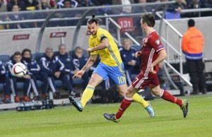 Sweden’s forward and team captain Zlatan Ibrahimovic shoots during one minute of silence for the victims of Paris attacks ahead of the Euro 2016 play-off football match between Sweden and Denmark at the Friends arena in Solna on Sunday. AFP PHOTO