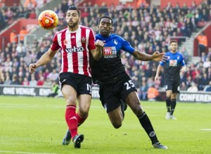 Bournemouth’s Sylvain Distin (right) vies with Southampton’s Graziano Pelle during the English Premier League football match between Southampton and Bournemouth at St Mary’s Stadium in Southampton, southern England on Monday. AFP PHOTO