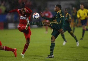 Alvas Powell No.2 of Portland Timbers dribbles the ball against Blas Perez No.7 of FC Dallas during the Western Conference Finals-Leg 2 of the MLS playoffs at Toyota Stadium on Monday in Frisco, Texas. AFP PHOTO