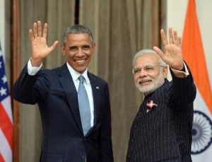 AT ODDS ON CLIMATE PACT  Indian Prime Minister Narendra Modi and US President Barack Obama wave prior to a meeting in New Delhi on January 25. The two leaders are expected to meet on the sidelines of this week’s COP-21 climate summit in Paris, where they will attempt to iron out differences in their country’s positions on climate change mitigation. AFP PHOTO