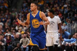 Stephen Curry No.30 of the Golden State Warriors celebrates a three-point basket against the Denver Nuggets at Pepsi Center on Monday in Denver, Colorado. AFP PHOTO