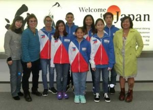 BIG IN JAPAN  Philippine Swimming League President Susan Papa, Secretary General Maria Susan Benasa, National Capital Region (NCR) Regional Director Joan Mojdeh and some members of the team seeing action in the prestigious 2015 Japan Swimming Championship beginning on November 14. CONTRIBUTED PHOTO