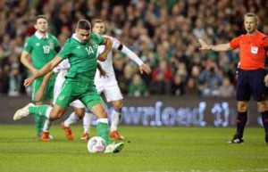 FIRST GOAL Ireland’s striker Jonathan Walters shoots to score his team’s first goal, from apenalty during a UEFA Euro 2016 Group D qualifying second leg play-off football match between Ireland and Bosnia Herzegovina at the Aviva stadium in Dublin on Tuesday. AFP PHOTO