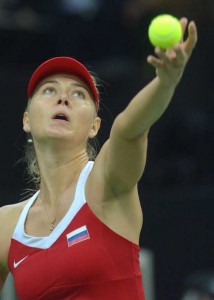 Maria Sharapova of Russia serves to Karolina Pliskova of Czech Republic during the International Tennis Federation Fed Cup final match between Czech Republic and Russia on Sunday in Prague. AFP PHOTO 