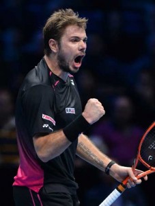 Switzerland’s Stan Wawrinka celebrates after beating Britain’s Andy Murray in a men’s singles group stage match on day six of the ATP World Tour Finals tennis tournament in London on Saturday. AFP PHOTO