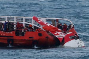 RUDDER FAULT BLAMED  In this file photograph taken on January 10, 2015 Indonesian search and rescue personnel pull wreckage of AirAsia flight QZ8501 onto a recovery ship. A fault with the rudder control system was a major factor in the December 2014 AirAsia plane crash into the Java Sea that left 162 people dead, Indonesian investigators said on December 1. AFP PHOTO