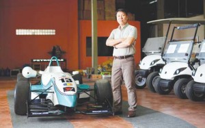 ohnny Tan stands beside one of the first Formula cars that participated in races held at the Batangas racetrack.