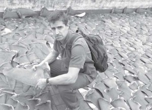 Emmy Award winning cinematographer, photographer, scuba diver, and marine conservationist Shawn Heinrichs is distraught at the volume of shark fins collected at a facility in China