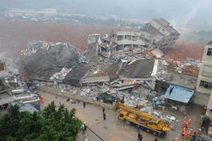 GRIM SCENE  A general view shows destroyed buildings after a landslide hit an industrial park in Shenzhen, south China’s Guangdong province on December 20. A massive landslide at an industrial park in southern China buried 22 buildings and left 22 people missing, state media reported, as more than 1,500 emergency workers searched the scene. AFP PHOTO