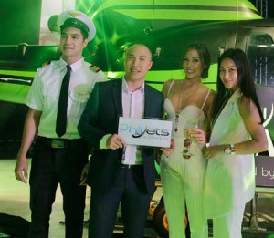 The French-Cambodian expatriate (second from left) with GrabTaxi ambassadors Solenn Heussaff and Mikaela Martinez