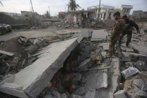 VICTORIOUS  Members of Iraq’s elite counter-terrorism service check the rubble of a building on December 27 in the Hoz neighborhood in central Ramadi, the capital of Iraq’s Anbar province, about 110 kilometers west of Baghdad, during military operations conducted by Iraqi pro-government forces against the Islamic State (IS) jihadist group. Jihadist fighters abandoned their last stronghold in Ramadi today, bringing Iraqi federal forces within sight of their biggest victory since last year’s massive offensive by the Islamic State group. AFP PHOTO