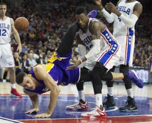 CATCH MY FALL Larry Nance Jr. No.7 of the Los Angeles Lakers falls over Robert Covington No.33 of the Philadelphia 76ers on Wednesday at the Wells Fargo Center in Philadelphia, Pennsylvania. AFP PHOTO