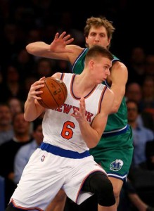 Kristaps Porzingis No.6 of the New York Knicks tries to get around Dirk Nowitzki No.41 of the Dallas Mavericks in the first half at Madison Square Garden on Tuesday in New York City. AFP PHOTO