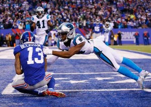 Odell Beckham No.13 of the New York Giants scores a game-tying touchdown against Josh Norman No.24 of the Carolina Panthers in the fourth Quarter during their game at MetLife Stadium on Monday in East Rutherford, New Jersey. AFP PHOTO