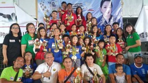 The Most Outstanding Swimmer awardees show their trophies with Philippine Swimming League President Susan Papa and Secretary General Maria Susan Benasa. CONTRIBUTED PHOTO